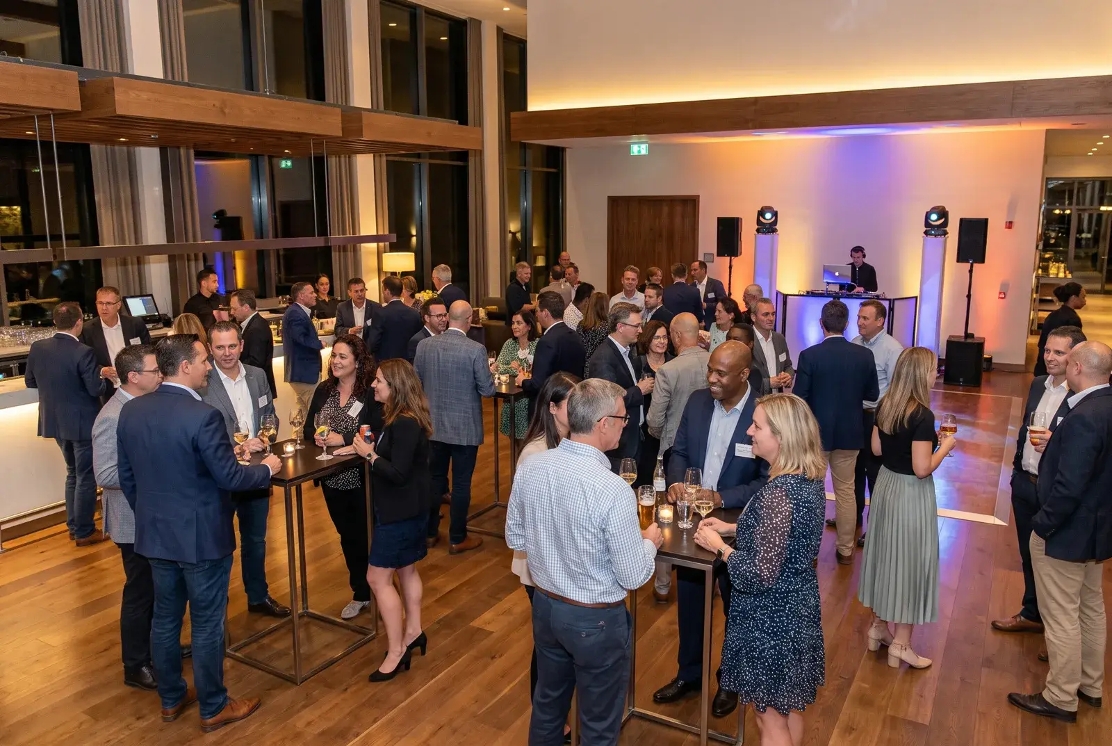 Corporate guests socialising at a Feel the Presha company event