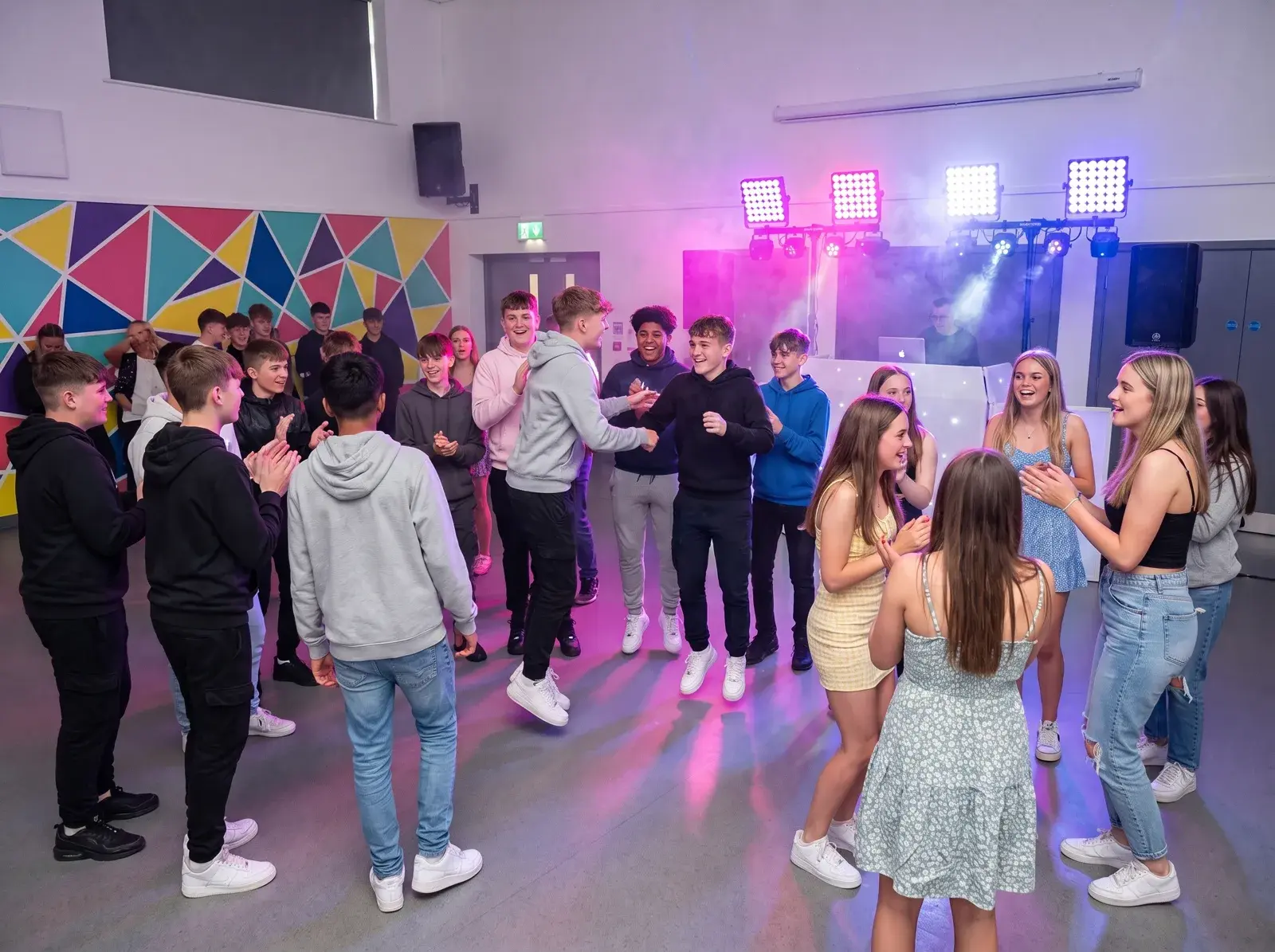 Teenagers dancing together at a Feel the Presha 16th/18th birthday party